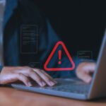 GenAI security risks showing data leakage, AI hallucination, phishing, and insecure code threats in workplace environments