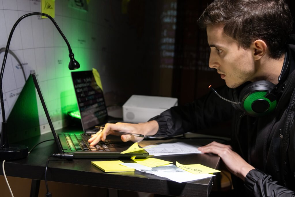 Top ethical hacking tools including Kali Linux, Nmap, Wireshark, Metasploit, and Burp Suite displayed on a cybersecurity analyst workstation